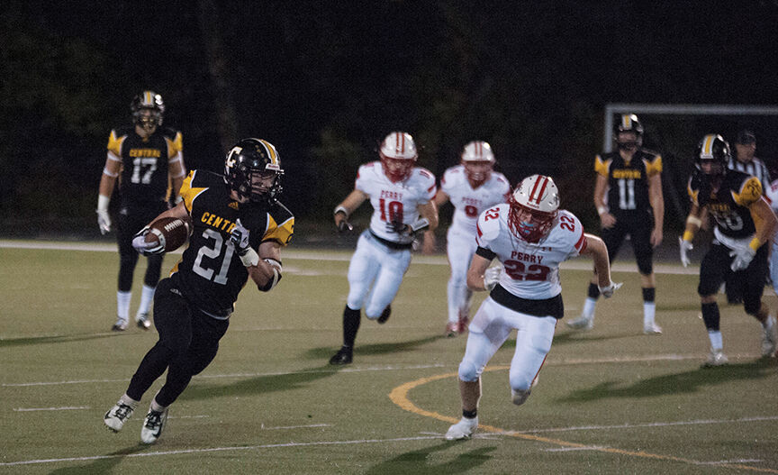 jc Dillon Preston breaks one of his five rushing TD's.jpg